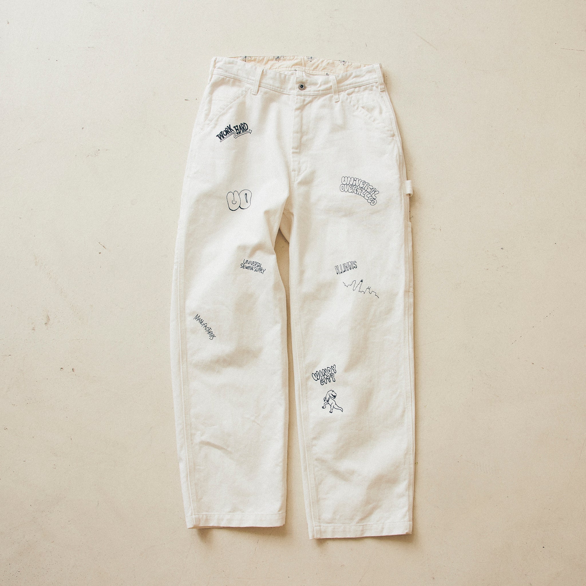 GRAFFITI LOGO PANTS【U2433601-100TH】